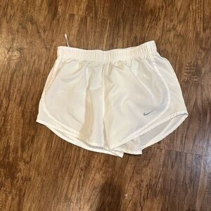 White Nike shorts